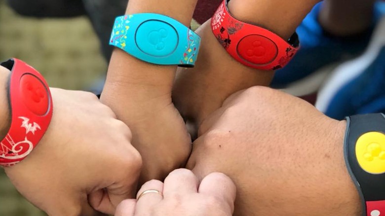 Hands with Disney MagicBands