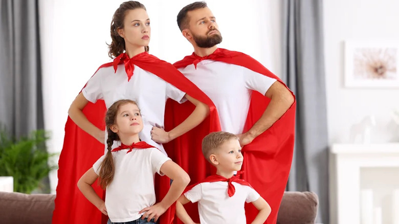 family in red capes