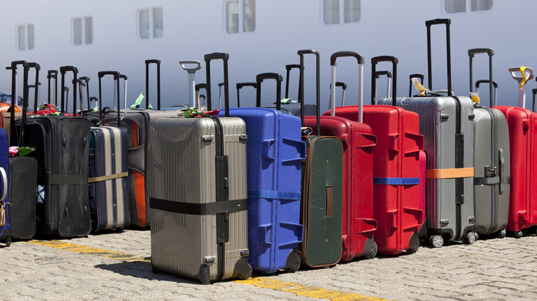 Suitcases with luggage straps