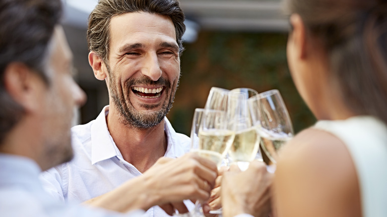 Group toasting with champagne