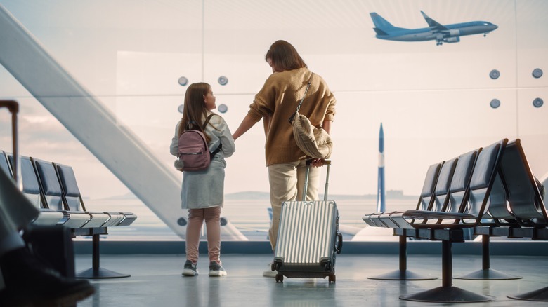 Parent and child at airport