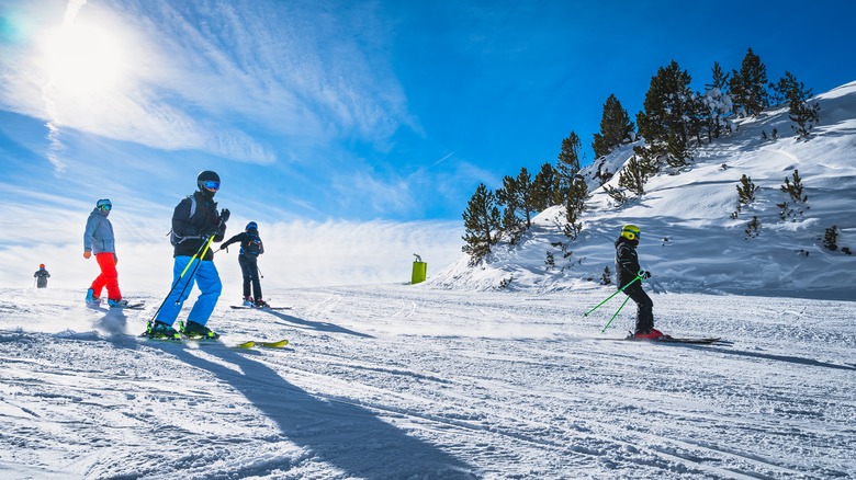 People skiing on slope