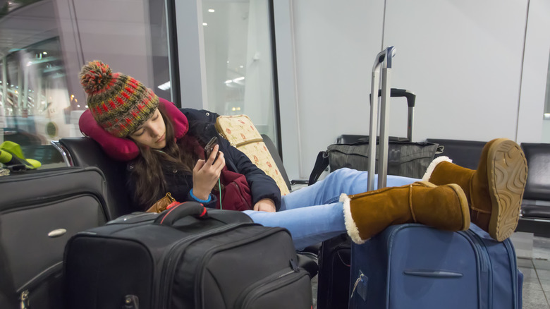 Person relaxing at airport