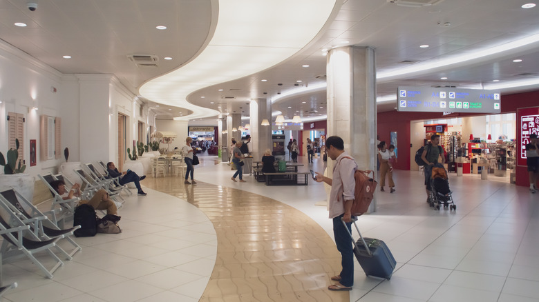 Airport walkway near retail stores