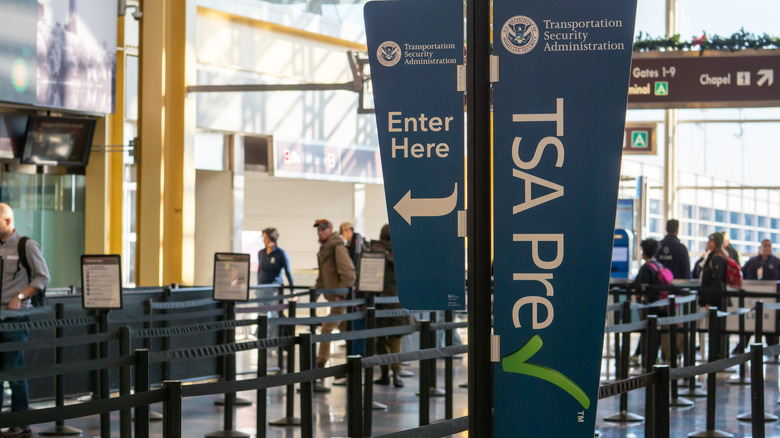 Signs for the TSA PreCheck line