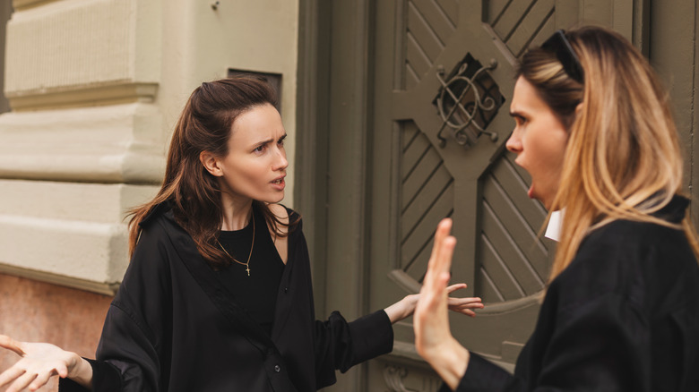 Two women quarreling outside