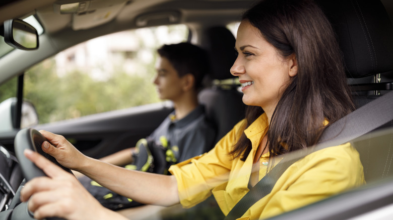 woman and son in car