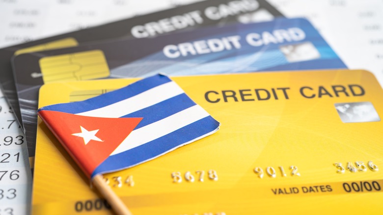 Small Cuban flag on top of credit cards