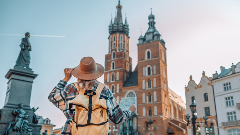 Woman looking at a monument in Poland