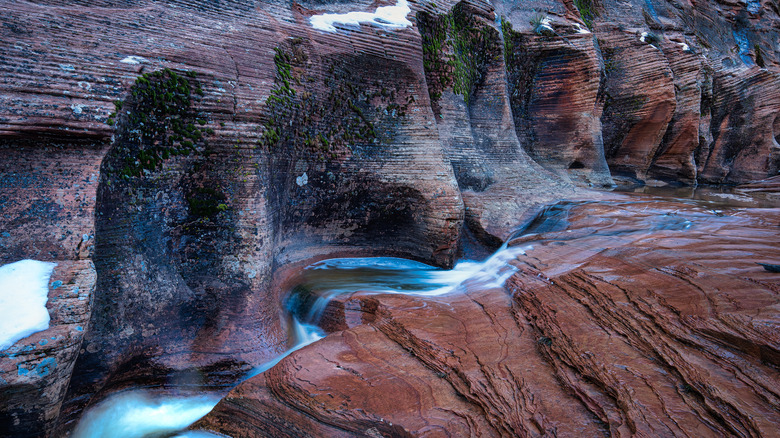 Water flowing through Slickrock Canyon