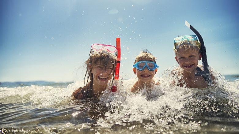 Children playing in the ocean