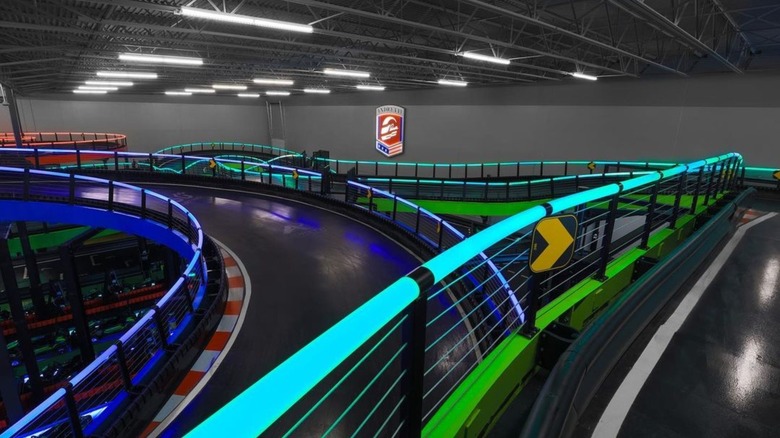 Indoor racing track with neon lights