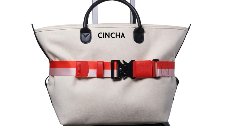 A Cincha Travel Belt on a bag