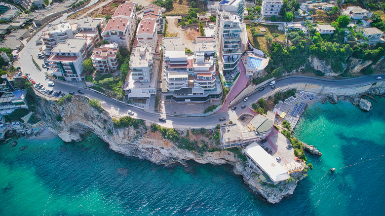 aerial view of buildings near ocean