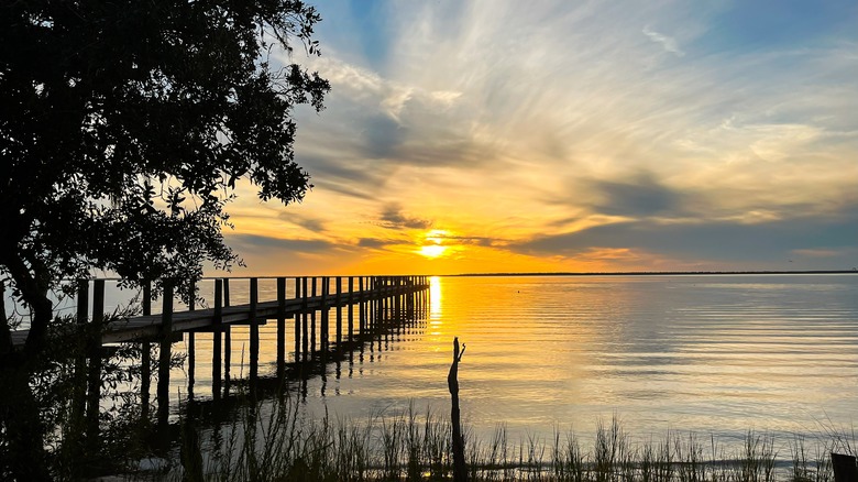 sunset scene at fishing pier in Eastpoint, Florida