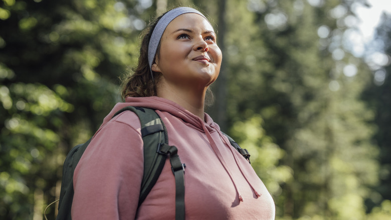 Woman smiling during hike