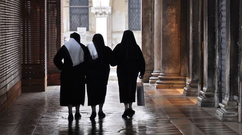 Nuns in habit walking together