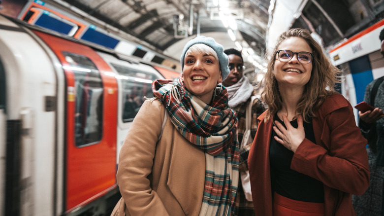 Friends enjoying London Underground