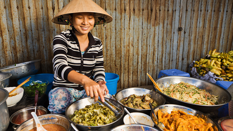 Vietnamese woman preparing food