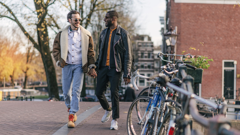 Gay couple strolling through Amsterdam