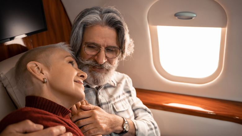 Mature couple in first class