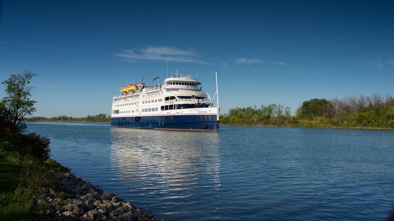 A cruise ship navigates through Great Lakes waters.