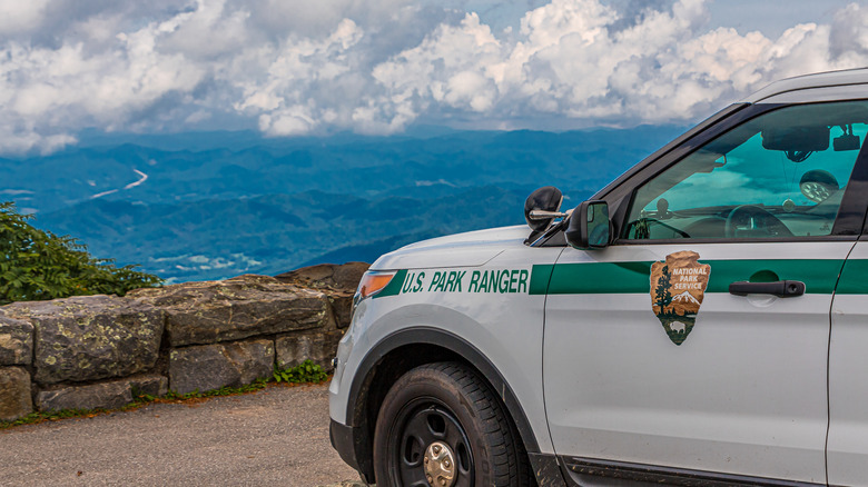 Park ranger car overlooking landscape