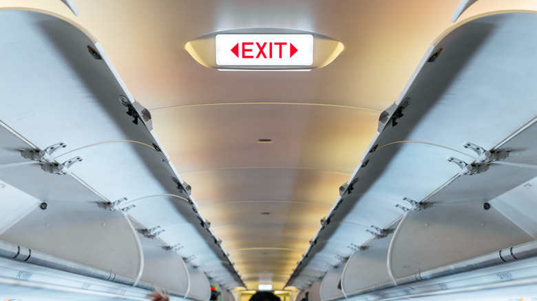 Exit sign on an airplane