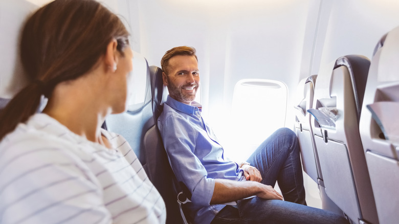 Friendly passengers on airplane