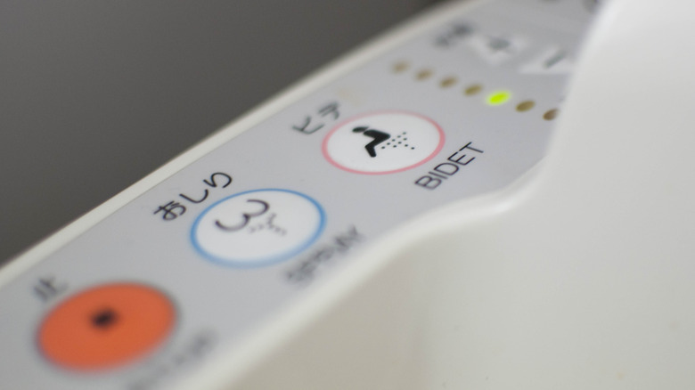 Japanese bidet settings on toilet