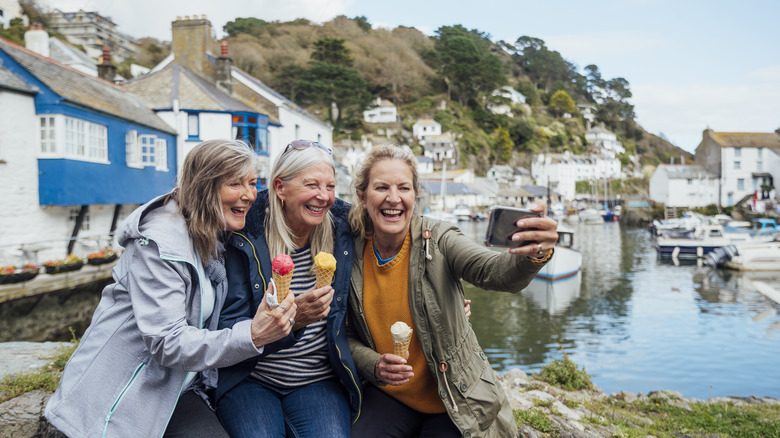 senior tourists taking a selfie