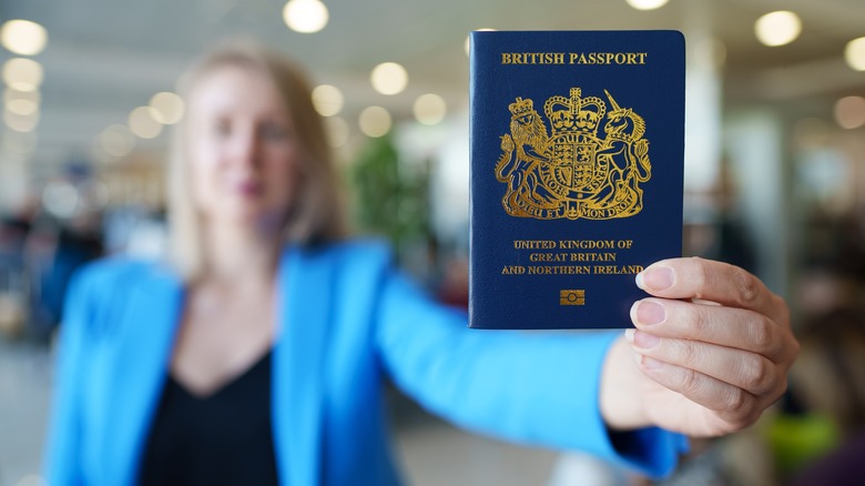 Woman holding a British passport
