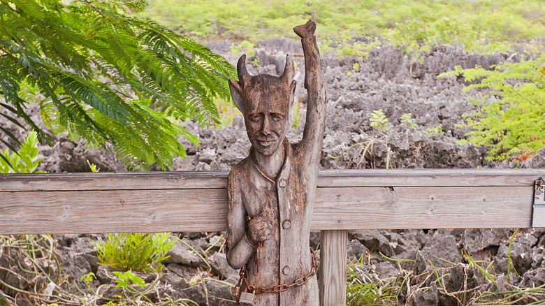 Wooden devil statue on Hell's overlook