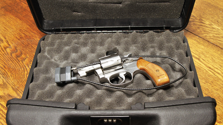 Locked revolver gun in case