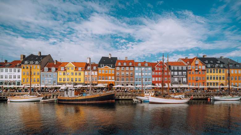 Nyhaven, Copenhagen row houses behind boats.