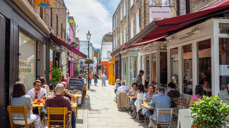 Patio-lined street of Camden Passage in London, England