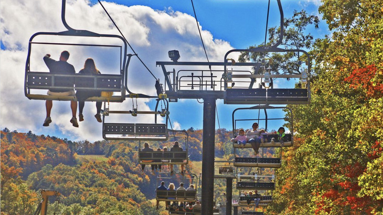 People enjoying fall foliage from the chair lifts at Massanutten Resort.