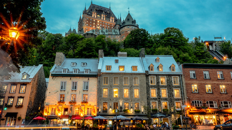 Château Frontenac behind historic buildings