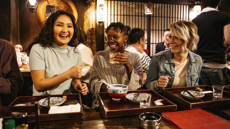 Women eating in Japanese restaurant