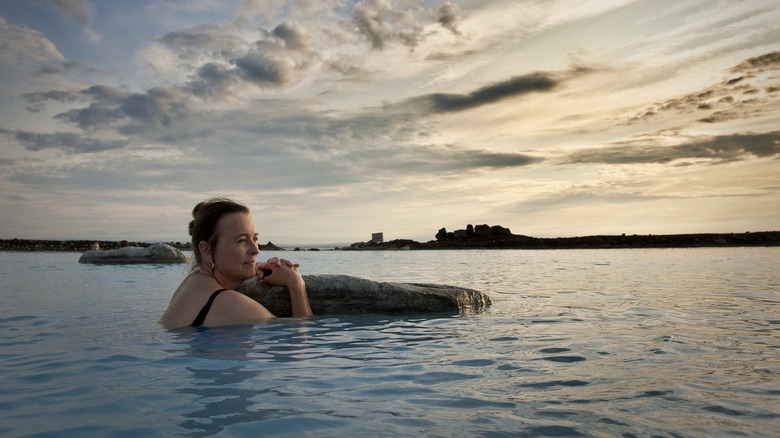 Woman bathing in Mývatn Lake