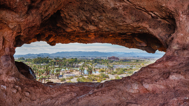 valley view through window-like rock hole