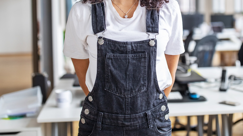 woman wearing overalls