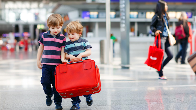 cute kids at airpot 