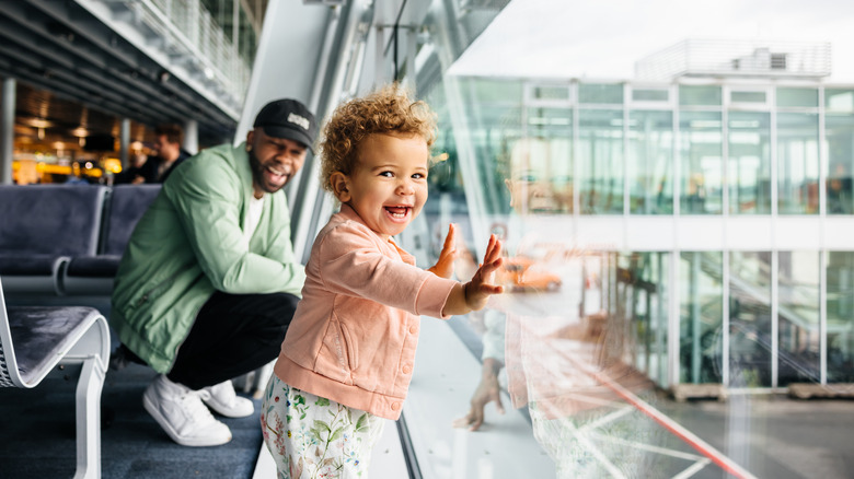 happy toddler in the airport 