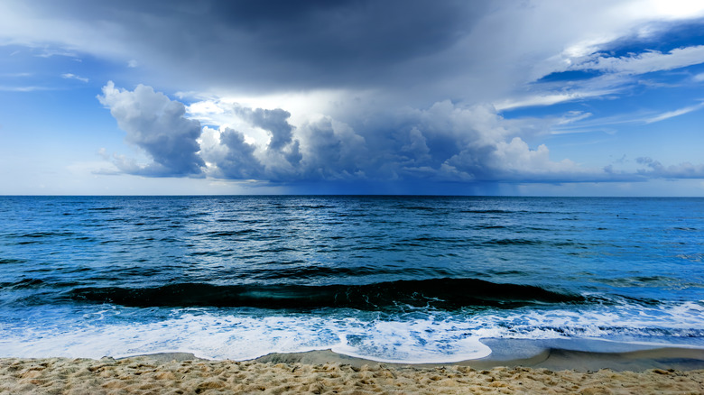 ominous beach dark clouds