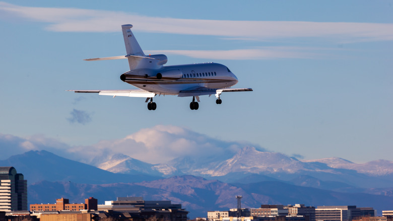 Airplane landing near Rocky Mountains