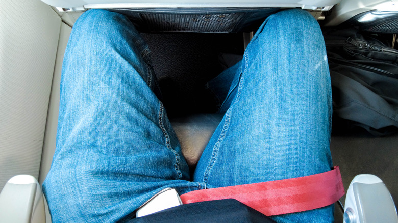 Cramped legs in airplane seat