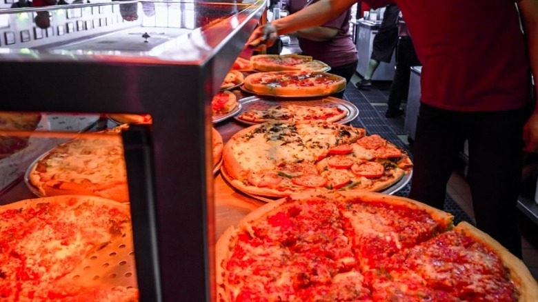 cooks making Ricobene's pizza