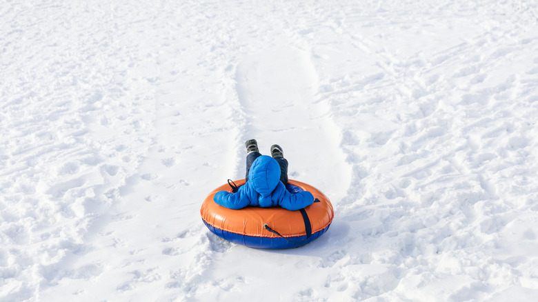 Child snow tubing 