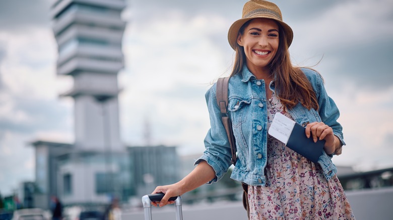 Female traveler with passport